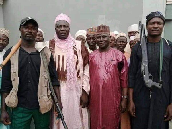 Officials pose with Yan Sa Kai vigilantes in the town of Mairairai, Kebbi State, Nigeria, on Aug. 1, 2020. (Courtesy of Murtala Gotomo)