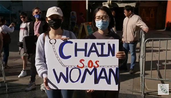 In front of the Grauman's Chinese Theater in Los Angeles, Chinese nationals support the chained woman and hope that she will be free as soon as possible. March 8, 2022. (Supplied)