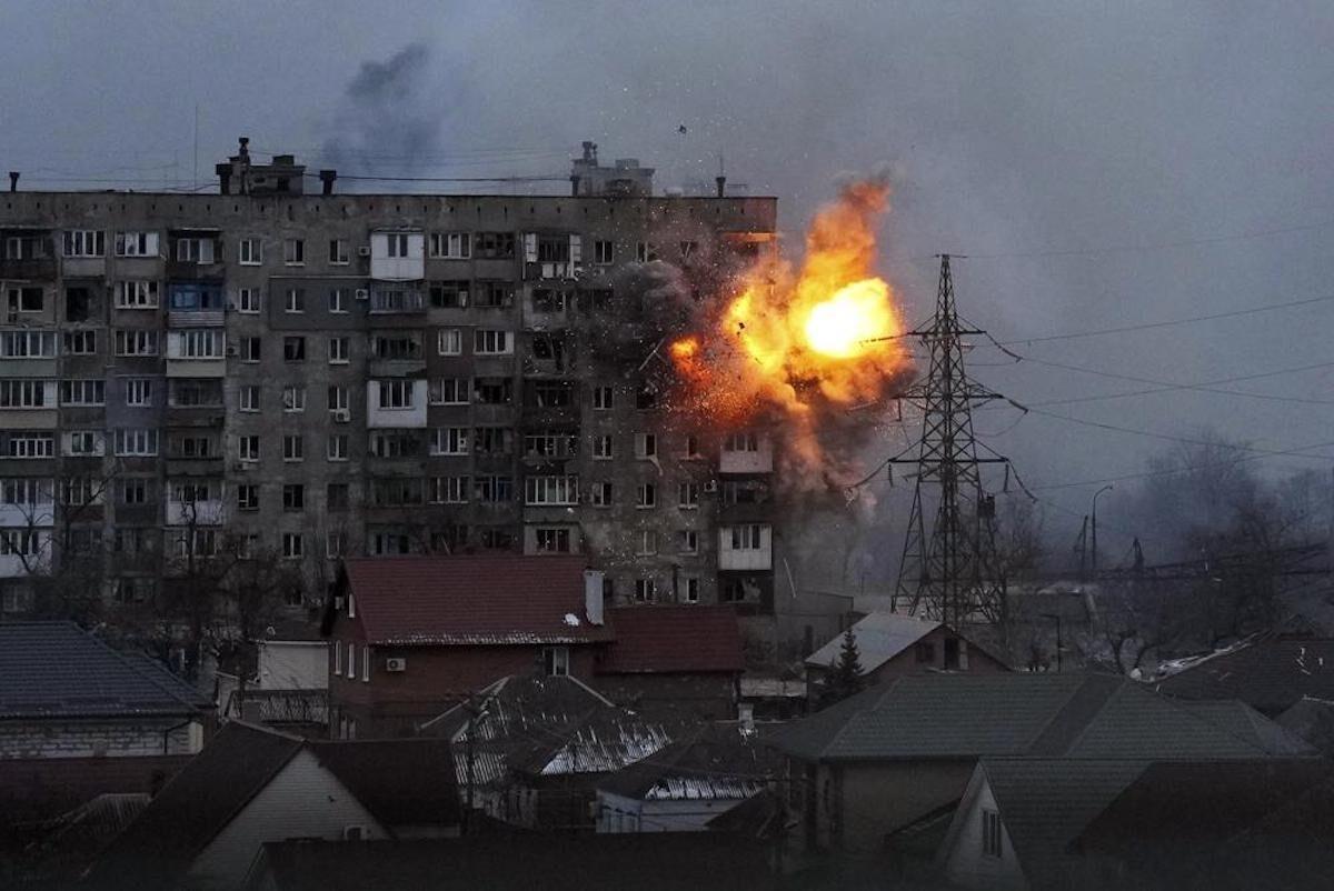 An explosion in an apartment building in Mariupol, Ukraine, on March 11, 2022. (Evgeniy Maloletka/AP Photo)