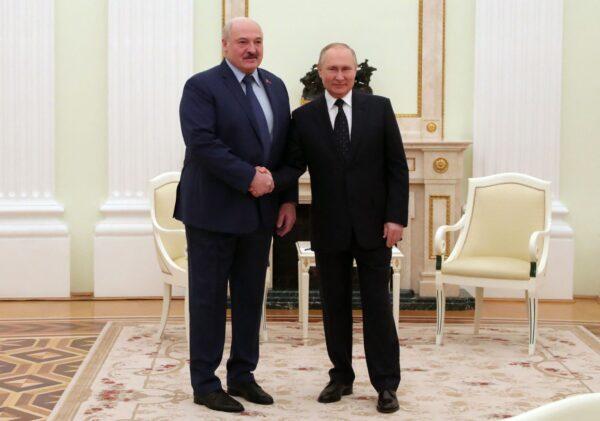 Russian President Vladimir Putin meets with his Belarus counterpart Alexander Lukashenko at the Kremlin in Moscow, on March 11, 2022. (Mikhail Mikhail Klimentyev/Sputnik/AFP via Getty Images)