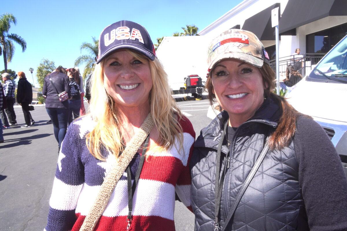 Apryll Held of Orange County, California (L), and Sherry Schmidt of Bozeman, Mont., said Clay Clark's "Reawaken America" tour event was educational about conservative values. (Allan Stein/The Epoch Times)