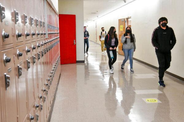 Returning students walk the hallway at Hollywood High School in Los Angeles on April 27, 2021. (Rodin Eckenroth/Getty Images)