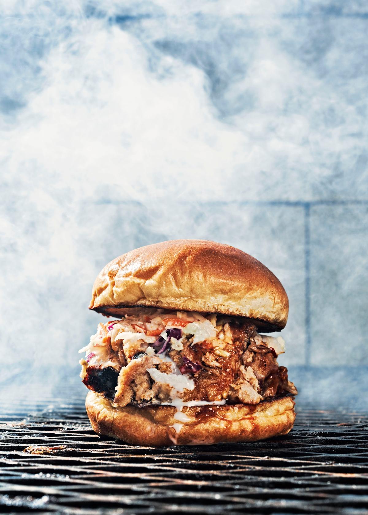 The reward: Martin's famed pulled pork sandwich is made with meat pulled straight off the hog, topped with coleslaw. (Courtesy of Andrew Thomas Photography)