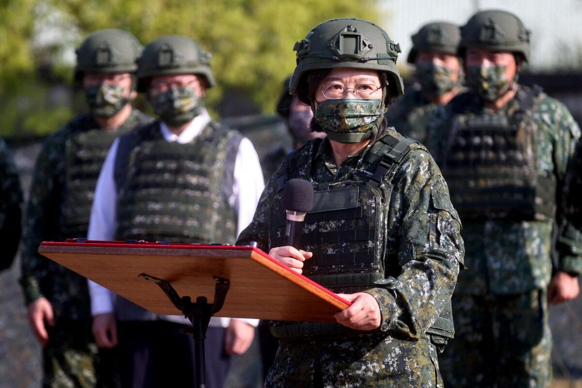 Taiwanese President Tsai Ing-wen visits army reservist troops during a training in Nanshipu, Taiwan, on March 12, 2022. (Ann Wang/Reuters)