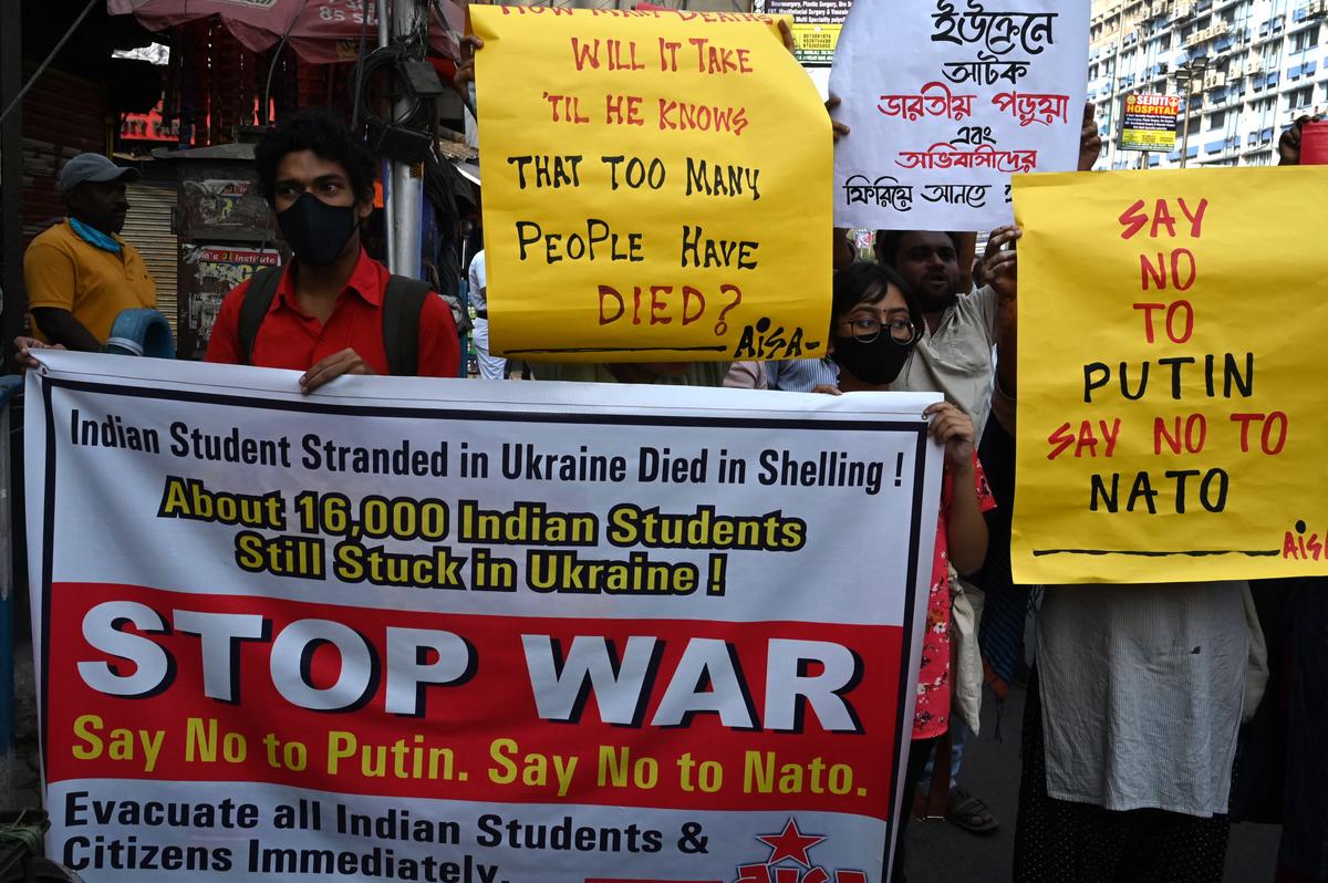 Leftist students shout slogans to protest Russia's invasion of Ukraine, in Kolkata on March 3, 2022. (Dibyangshu Sarkar/AFP via Getty Images)