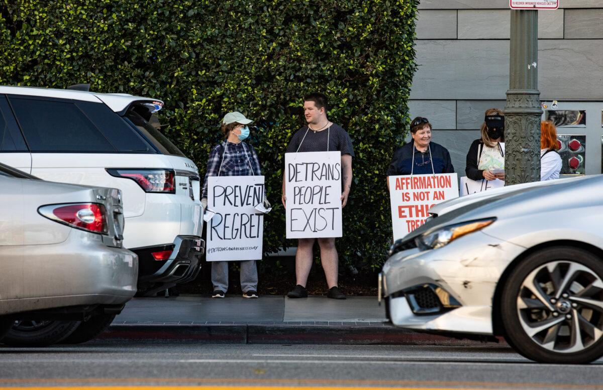 Demonstrators share about Detransition Awareness Day in Los Angeles on March 12, 2022. (John Fredricks/The Epoch Times)