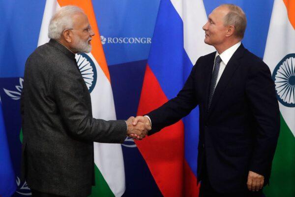 Russian President Vladimir Putin shakes hands with India’s Prime Minister Narendra Modi during a joint press conference ahead of the Eastern Economic Forum in Vladivostok, Russia, on Sept. 4, 2019. (Mikhail Metzel/AFP via Getty Images)