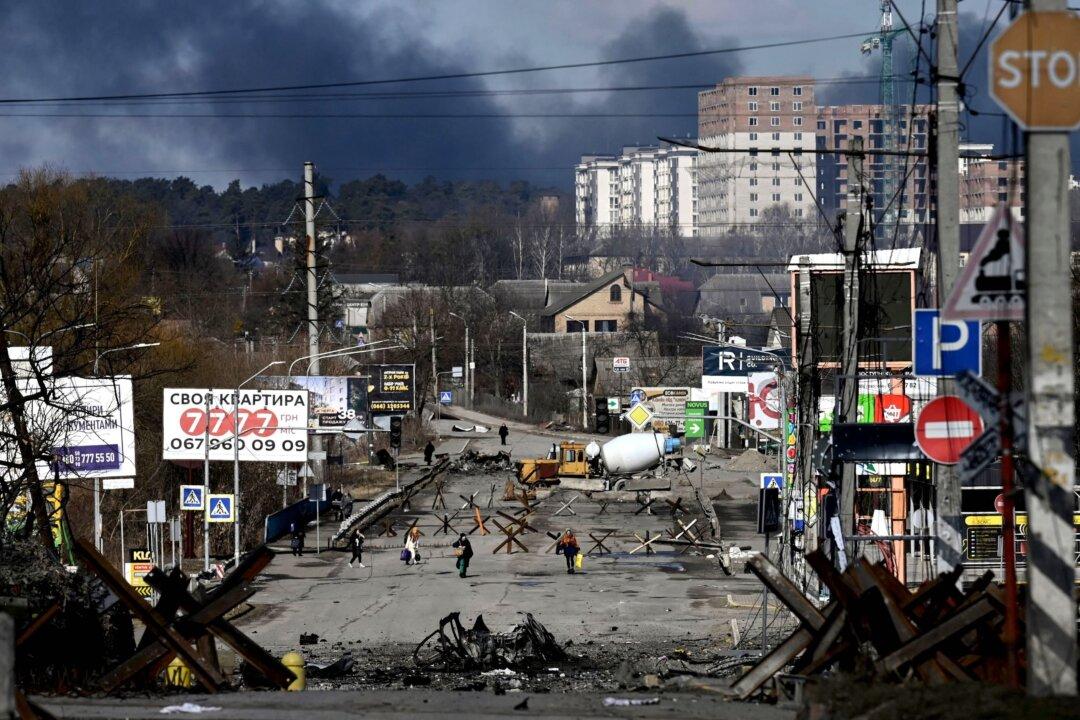 Ukrainian Forces Retake Control of Key Town Outside Kyiv, Mayor Claims