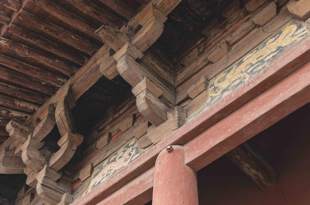 Detailed dougong (brackets) supports of Wooden Pagoda or Sakyamuni Pagoda at Fogong Temple in Yingxian, Shuozhou, Shanxi, China. Built in 1056, world's tallest & oldest existing wooden tower. Color frescos. (SCQBJ-JZ/Getty)