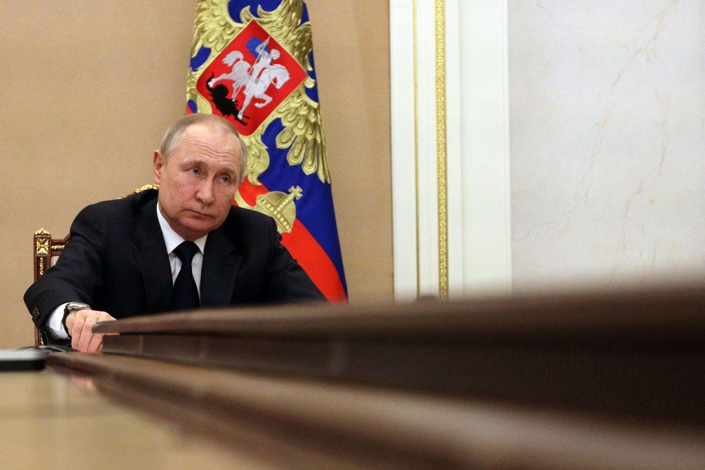 Russian President Vladimir Putin chairs a meeting with members of the Russian government via teleconference in Moscow on March 10, 2022. (SputnikAFP/Getty Images/Mikhail Klimentyev)