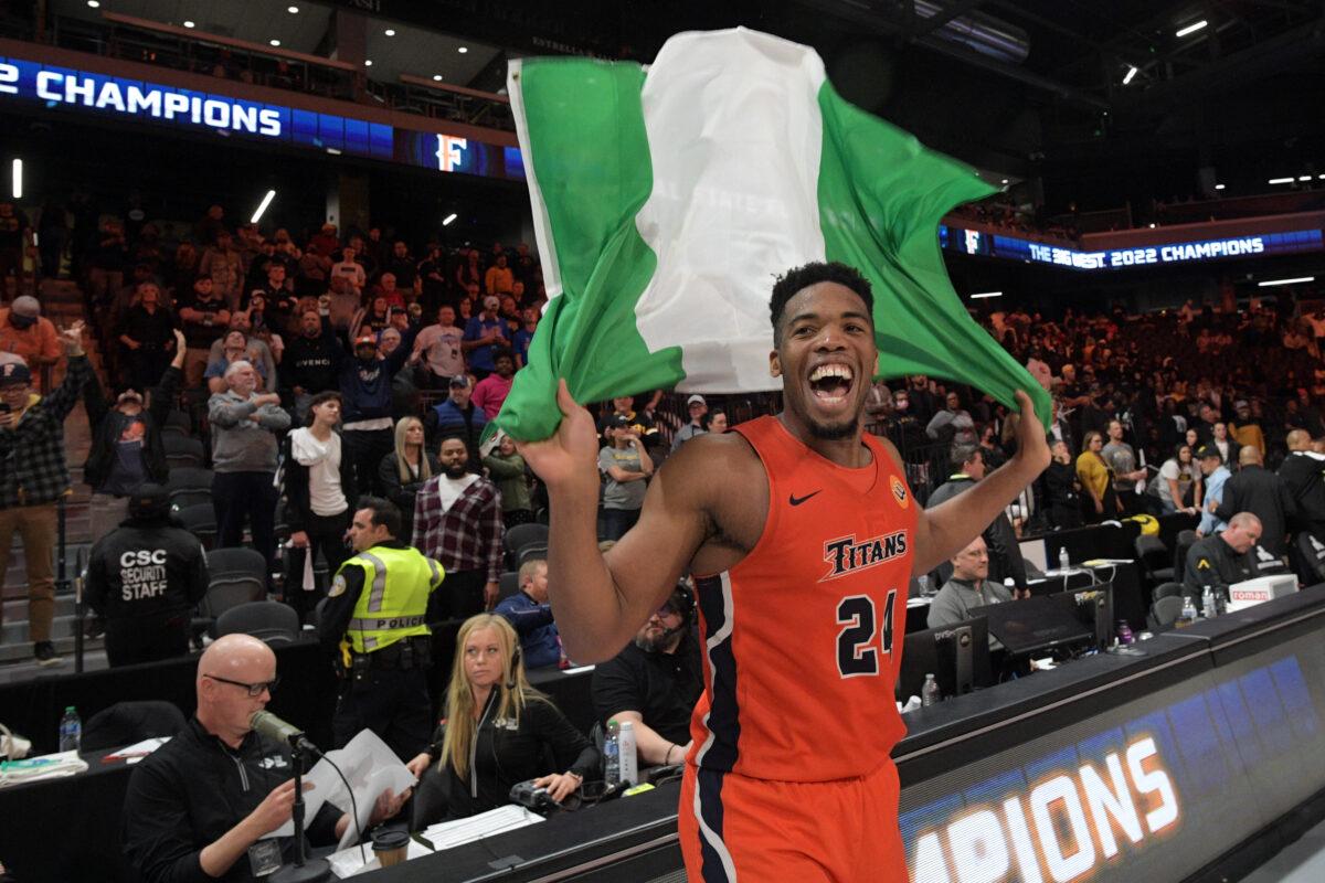 E.J. Anosike #24 of the Cal State Fullerton Titans celebrates the 72-71 win over Long Beach State during the championship game of the Big West Conference basketball tournament in Henderson, Nev., on March 12, 2022. (Sam Morris/Getty Images)