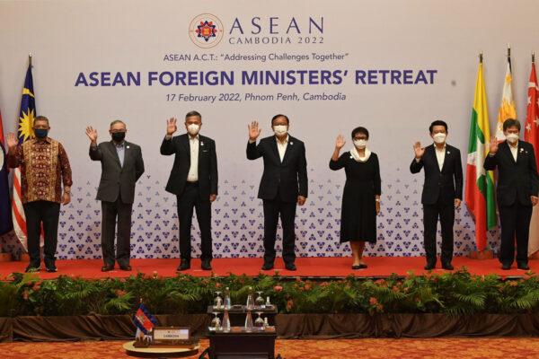 Foreign ministers of the Association of Southeast Asian Nations (ASEAN) from L-R:<br/>Malaysia's Saifuddin Abdullah, Philippines' Teodoro Locsin, Singapore's Vivian Balakrishnan, Cambodia's Prak Sokhonn, Indonesia's Retno Marsudi, Laos' Saleumxay Kommasith and ASEAN Secretary-General Lim Jock Hoi pose for a group photo during the ASEAN Foreign Ministers' Retreat in Phnom Penh on Feb. 17, 2022. (Tang Chhin Sothy / AFP via Getty Images)