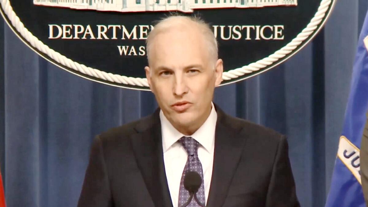 Justice Department's Assistant Attorney General for the National Security Division Matthew Olsen speaks at a press conference at the Justice Department in Washington on March 16, 2022, in a still from video. (Department of Justice/Screenshot via The Epoch Times)