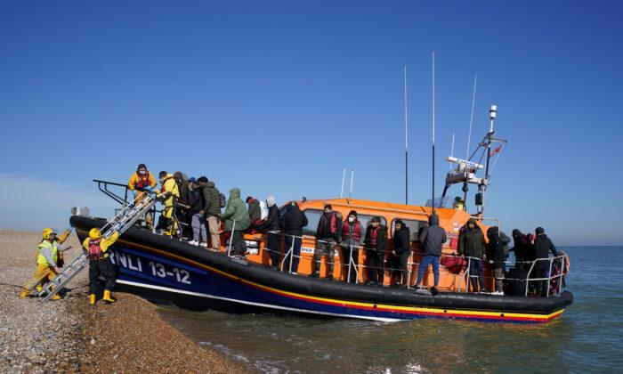 Minister Denies Royal Navy Is ‘Tour Guide’ for Illegal Immigrants in the Channel