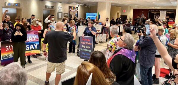 Protestors speaking out about the Parental Rights in Education bill walked through the Florida Capitol on March 7, chanting, "We say gay!" (Kevin Cho Tipton via Storyful)