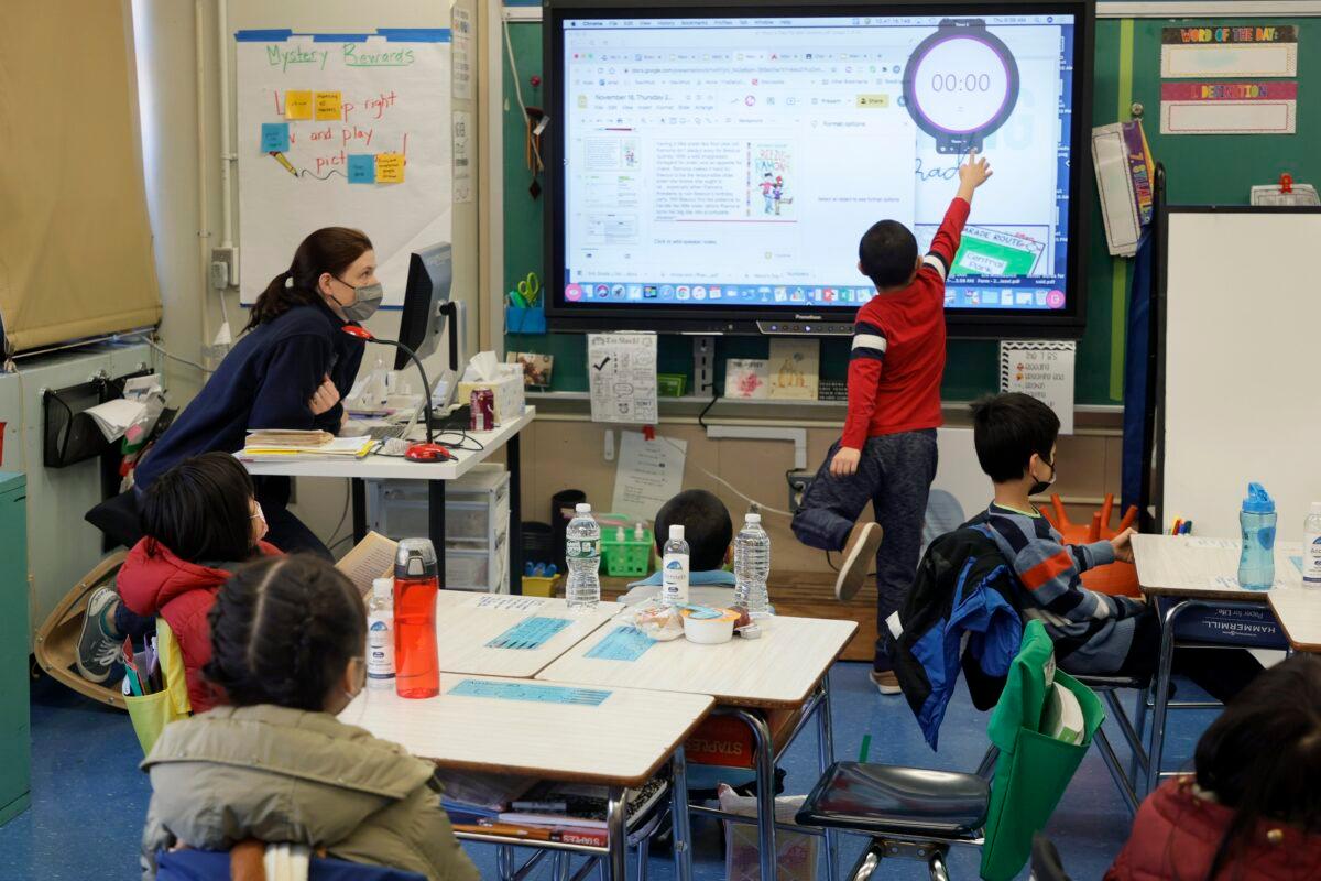 A teacher at Yung Wing School in New York gives a lesson on Nov. 18, 2021. (Michael Loccisano/Getty Images)