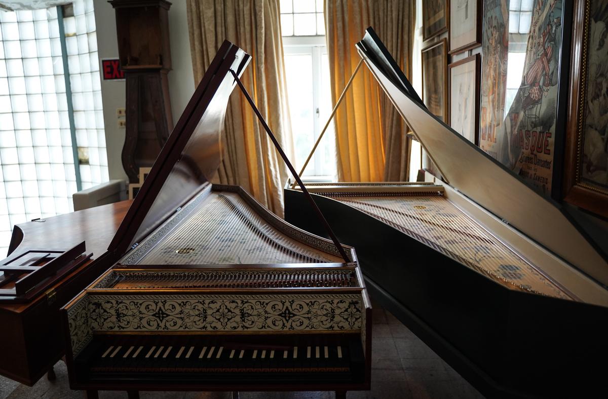 Harpsichords are adorned with period-accurate decorative elements, masterfully re-created by the shop's in-house artist. (Lux Aeterna Photography for American Essence)