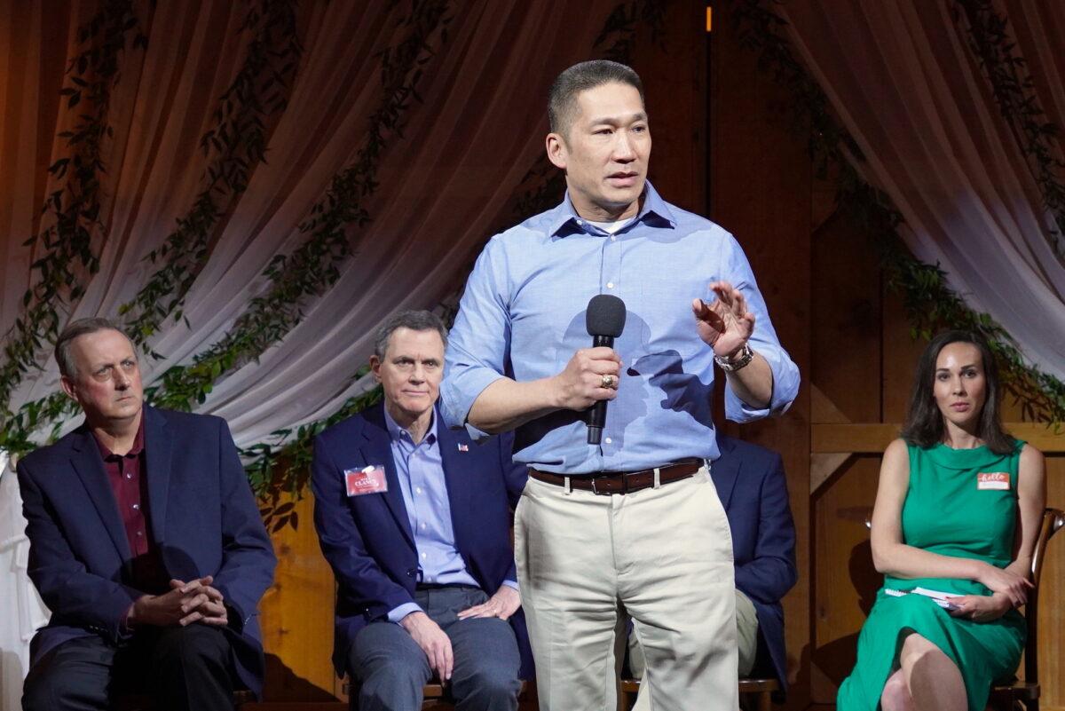 Hung Cao, a Republican congressional candidate for the 10th District of Virginia, at a Patriot Pub forum in Hamilton, Va., on Mar. 17, 2022. (L to R) David Beckwith, Mike Clancy, and Brooke Taylor. (Terri Wu/The Epoch Times)