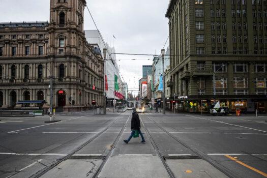  A person crosses Bourke Street in Melbourne, Australia, on July 20, 2021. (Daniel Pockett/Getty Images)