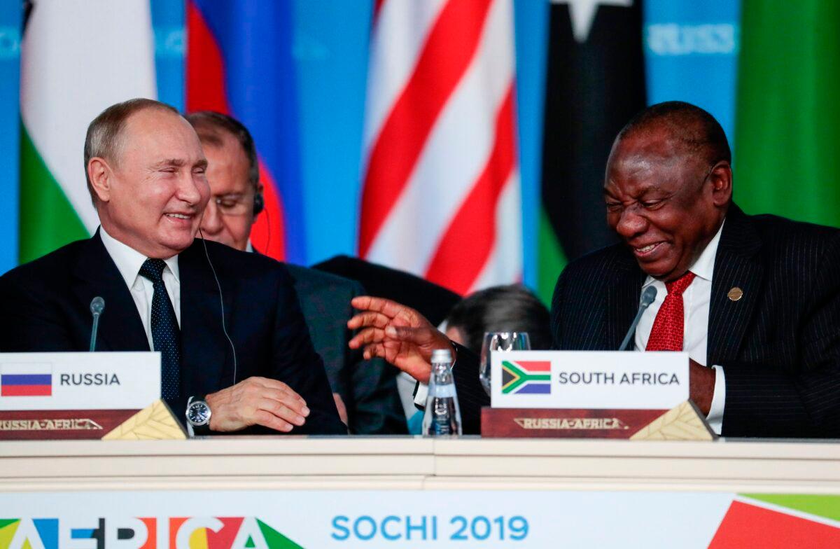 South African President Cyril Ramaphosa (R) and Russian President Vladimir Putin (L) attend the first plenary session as part of the 2019 Russia–Africa Summit at the Sirius Park of Science and Art in Sochi, Russia, on Oct. 24, 2019. (Chirikov/AFP via Getty Images)