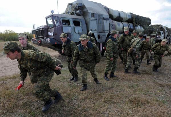 Picture taken in 2009 shows Belarussian soldiers near an S-300 surface-to-air missile complex used during the joint Russian–Belarussian military exercises "West-2009," some 230 kilometers (143 miles) southwest of Minsk, Belarus, near the village of Volka. (Viktor Drachev/AFP via Getty Images)