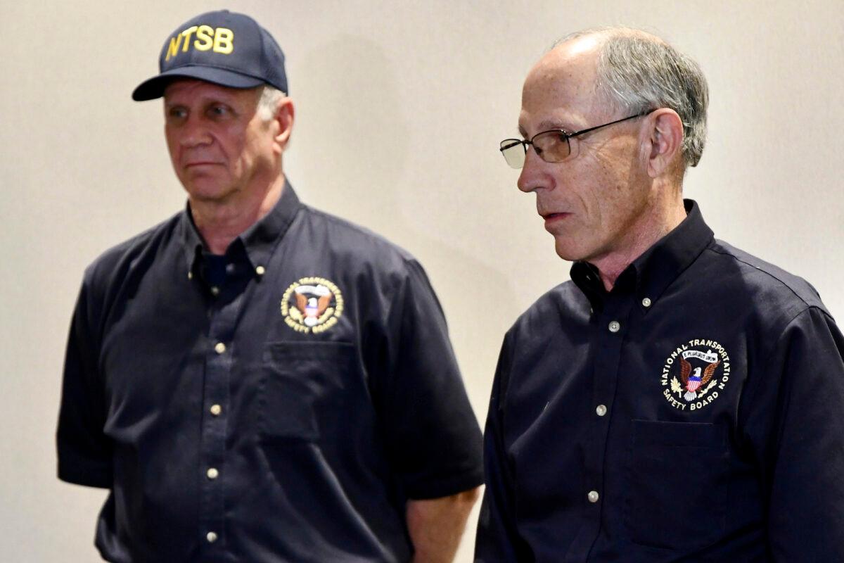 National Safety Transportation Board (NSTB) Vice Chairman Bruce Landsberg, right, and Investigator Robert Acetta answer questions from the media in Odessa, Texas, on March 17, 2022. (Mercedes Cordero/Reporter-Telegram via AP)