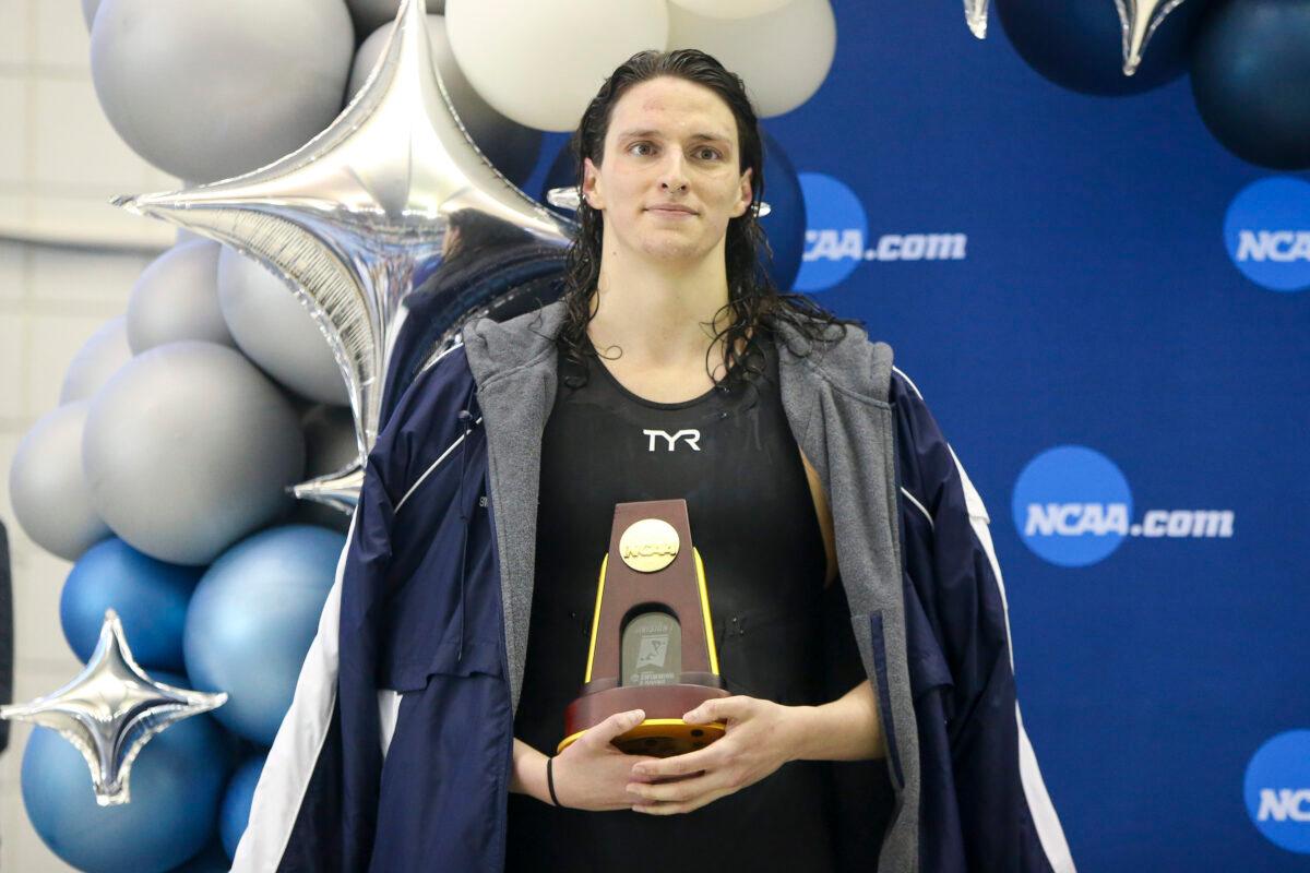 Penn Quakers transgender swimmer Lia Thomas holds a trophy after finishing first in the 500 freestyle at the NCAA Women's Swimming & Diving Championships at Georgia Tech. (Brett Davis/USA Today Sports)