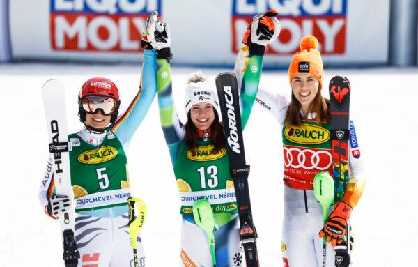 Slovenia's Andreja Slokar (C) celebrates after winning the women's slalom with second place Germany's Lena Duerr (L) and third place Slovakia's Petra Vlhova (R) at Alpine Ski World Cup in Meribel, France, on March 19, 2022. (Christian Hartmann/Reuters)