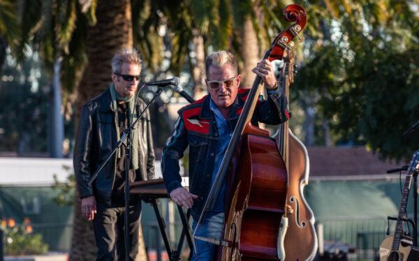 Lee Rocker at Uptown Newport Park in Newport Beach, Calif., commenced March 19, 2022. (John Fredricks/The Epoch Times)