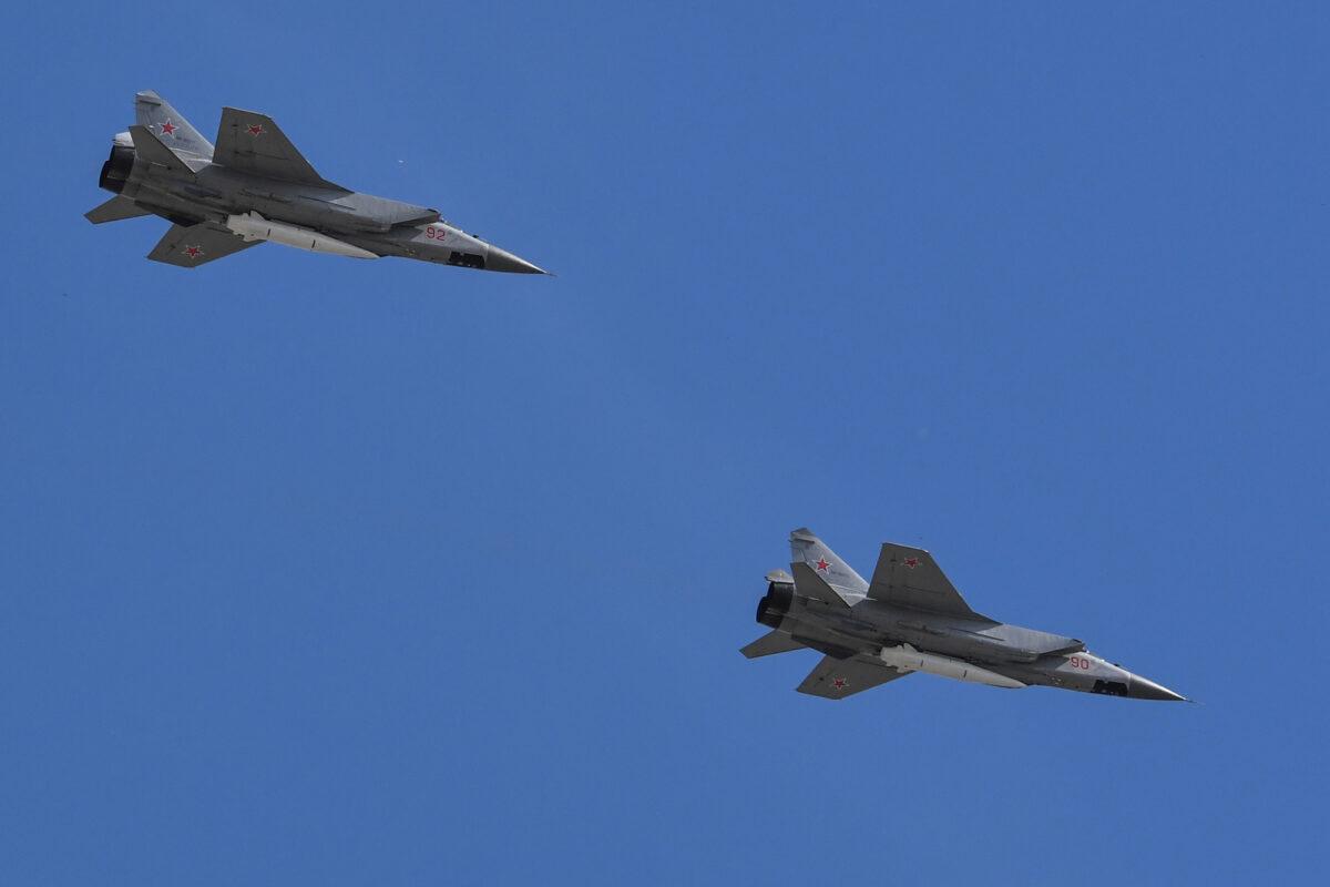 Russia's MiG-31 supersonic interceptor jets carrying hypersonic Kinzhal (Dagger) missiles fly over the Red Square during a military parade in Moscow, Russia, on May 9, 2018. (Yuri Kadobnov/AFP via Getty Images)