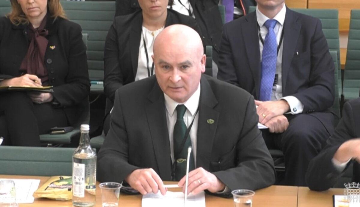 Mick Lynch, general secretary of the Rail, Maritime, and Transport union (RMT), answering questions in front of the Transport Committee and Business, Energy, and Industrial Strategy Select Committee in the House of Commons, London, on March 24, 2022. (House of Commons via PA Media)