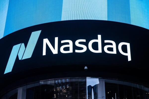 The Nasdaq logo at the Nasdaq Market site in Times Square in New York, on Dec. 3, 2021. (Reuters/Jeenah Moon)