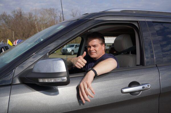 Todd Grenier from Raleigh, N.C., joins the People’s Convoy in Hagerstown, Md., on Mar. 19, 2022. (Terri Wu/The Epoch Times)