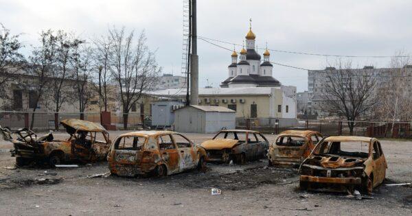 Cars burned after shelling near a church in the southeastern Ukrainian city of Mariupol, Donetsk region, Ukraine on Feb. 25, 2015. (Genya Savilov/AFP via Getty Images)