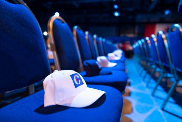 Hats wait to be claimed by VIPs in a reserved seating area at Conservative Party HQ on Election Day in Regina on Oct. 21, 2019. (The Canadian Press/Michael Bell)