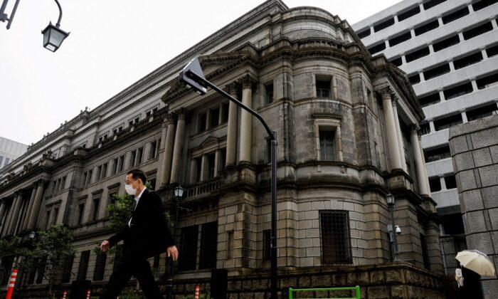 Japan’s Central Bank Renews Powerful Easing Pledge After Hawkish Fed Signal