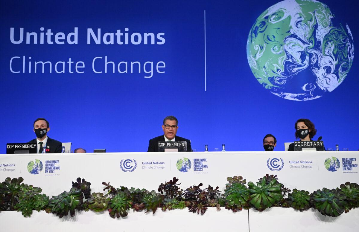 COP26 President Alok Sharma (C) speaks during the U.N. Climate Change Conference COP 26 in Glasgow, Scotland, on Nov. 13, 2021. (Jeff J Mitchell/Getty Images)