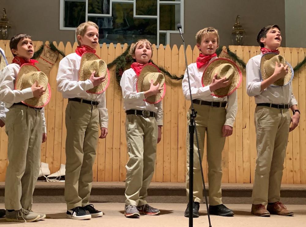 Students perform a couple of cowboy songs during the Christmas program. (Courtesy of BCBS)