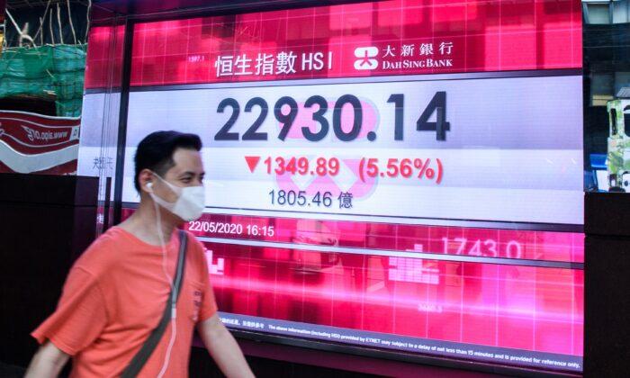 China Real Estate Stocks Climb Amid Debt Defaults Crisis