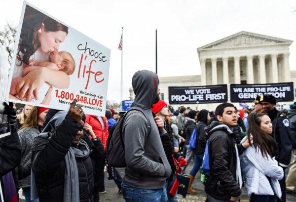 Pro-life activists demonstrate in front of the U.S. Supreme Court during the 47th annual March for Life in Washington on Jan. 24, 2020. (Olivier Douliery/AFP via Getty Images)