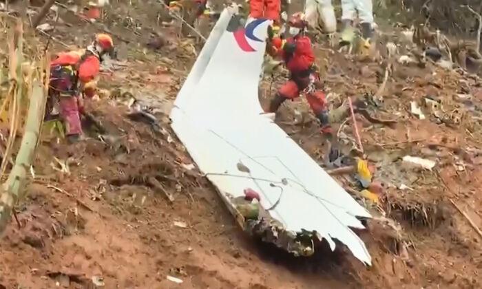 Searchers Find Wing, Engine Parts From China Eastern Crash