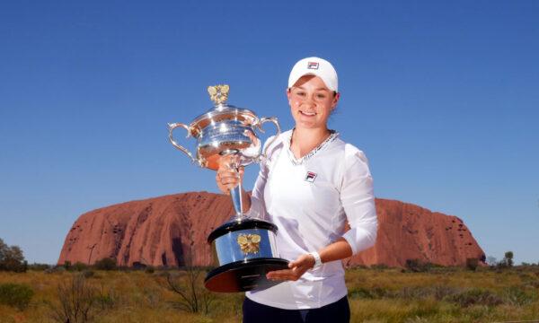 Ash Barty poses with the Daphne Akhurst Memorial Cup as she visits Uluru in the Uluru-Kata Tjuta National Park, Australia, on Friday, February 25, 2022. (Photo by Scott Barbour/Tennis Australia via Getty Images)