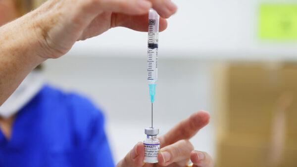 A COVID-19 vaccine is prepared at Sydney Road Family Medical Practice in Balgowlah in Sydney, Australia on January 10, 2022. (Jenny Evans/Getty Images)