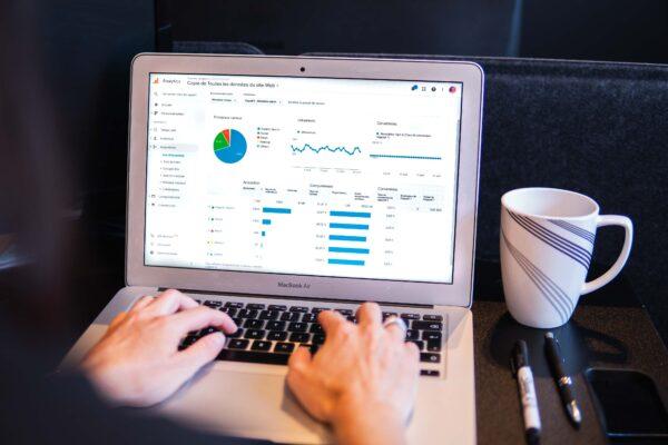 Stock photo of a reporting dashboard on a laptop's screen. (Myriam Jessier/Unsplash)
