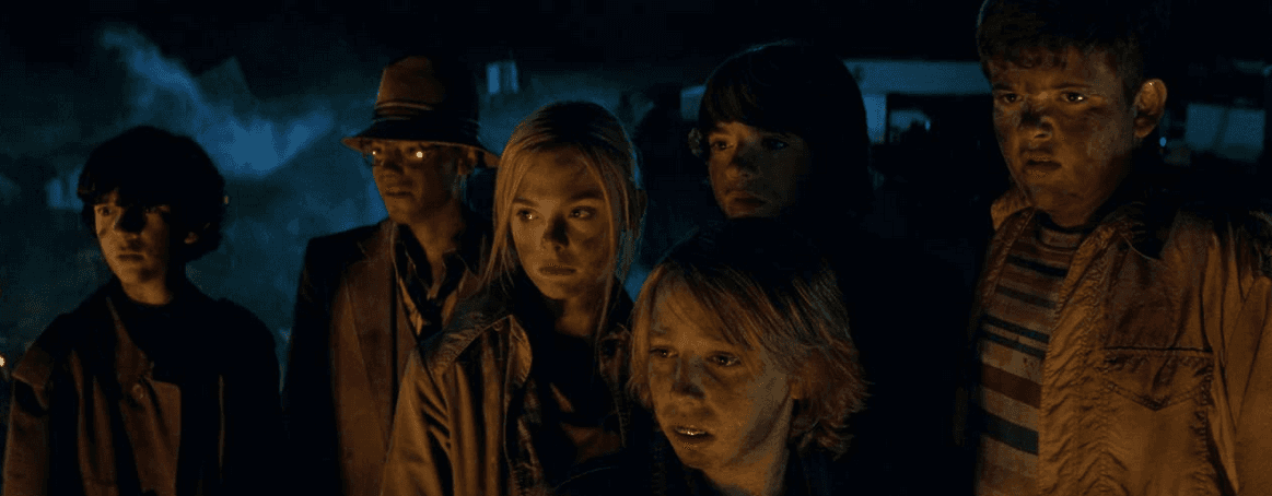 (L<strong>–</strong>R) Zach Mills, Gabriel Basso, Elle Fanning, Ryan Lee, Joel Courtney, and Riley Griffiths in "Super 8." (Francois Duhamel/Paramount Pictures)