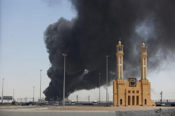 Smoke billows from a Saudi Aramco petroleum storage facility after an attack in Jeddah, Saudi Arabia, on March 26, 2022. (Stringer/Reuters)