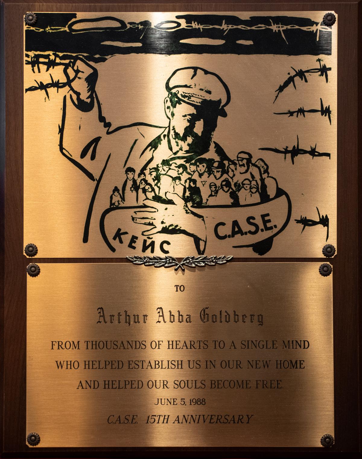 A plaque given to Arthur Goldberg by Russian emigrates in honor of his help to the community, created by Russian-American artist Marc Klionsky, in Jersey City, N.J., on June 5, 1988. (Samira Bouaou/The Epoch Times)