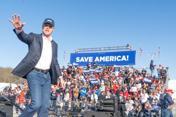 Former U.S. Senator and Republican candidate for governor of Georgia David Perdue waves to supporters of former President Donald Trump after speaking at a rally at the Banks County Dragway in Commerce, Georgia, on March 26, 2022. (Megan Varner/Getty Images)