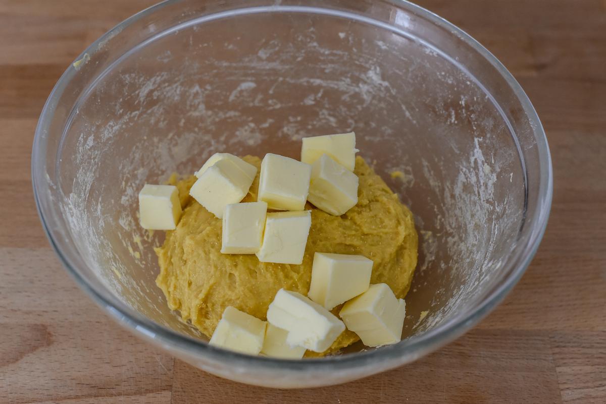 Incorporate the cold, cubed butter in increments, mixing well between each addition. (Audrey Le Goff)