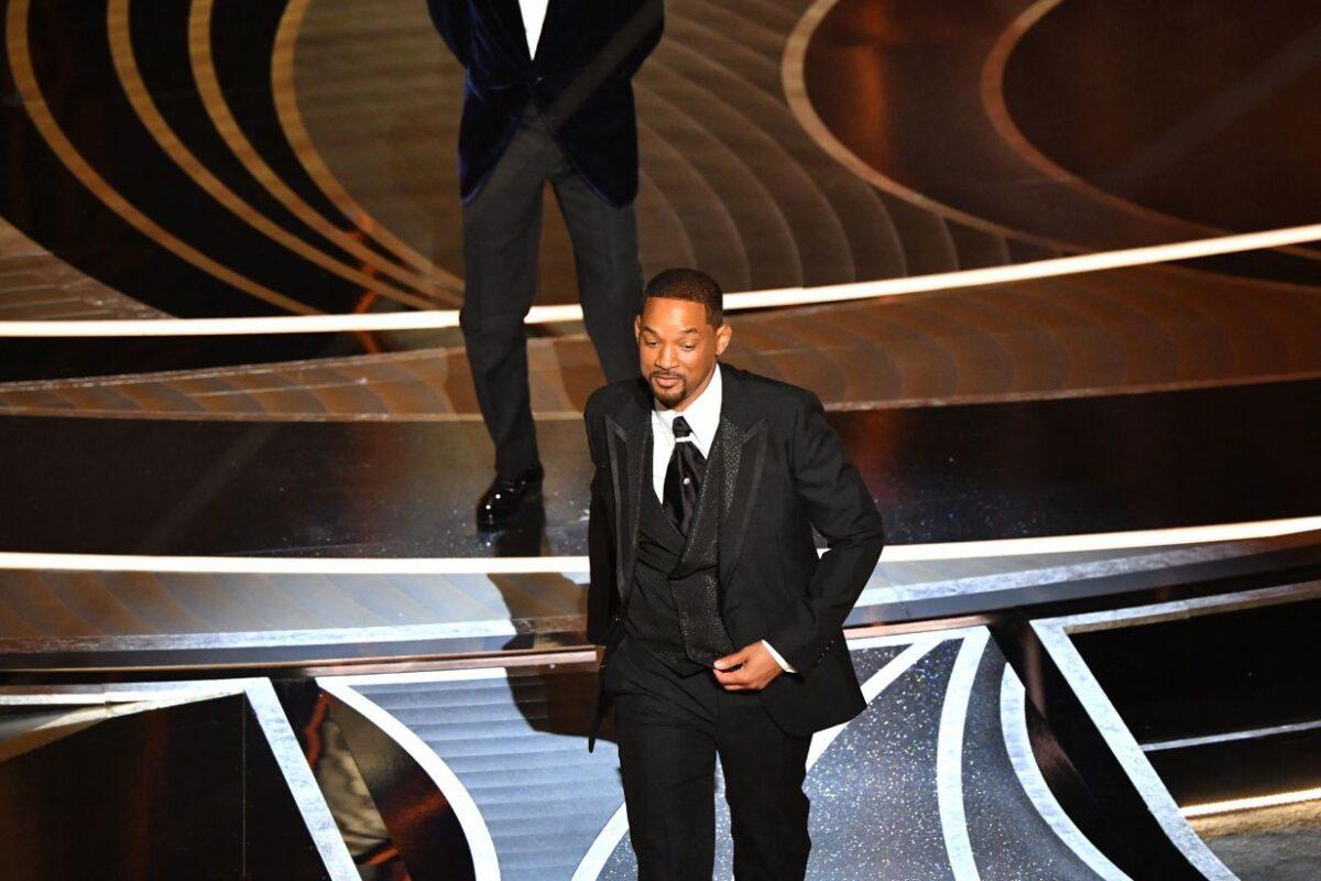 Will Smith walks away after appearing to slap actor Chris Rock onstage during the 94th Oscars at the Dolby Theatre in Hollywood, California on March 27, 2022. (Robyn Beck/AFP via Getty Images)